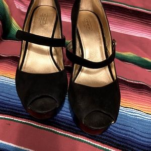 Coach wedges.